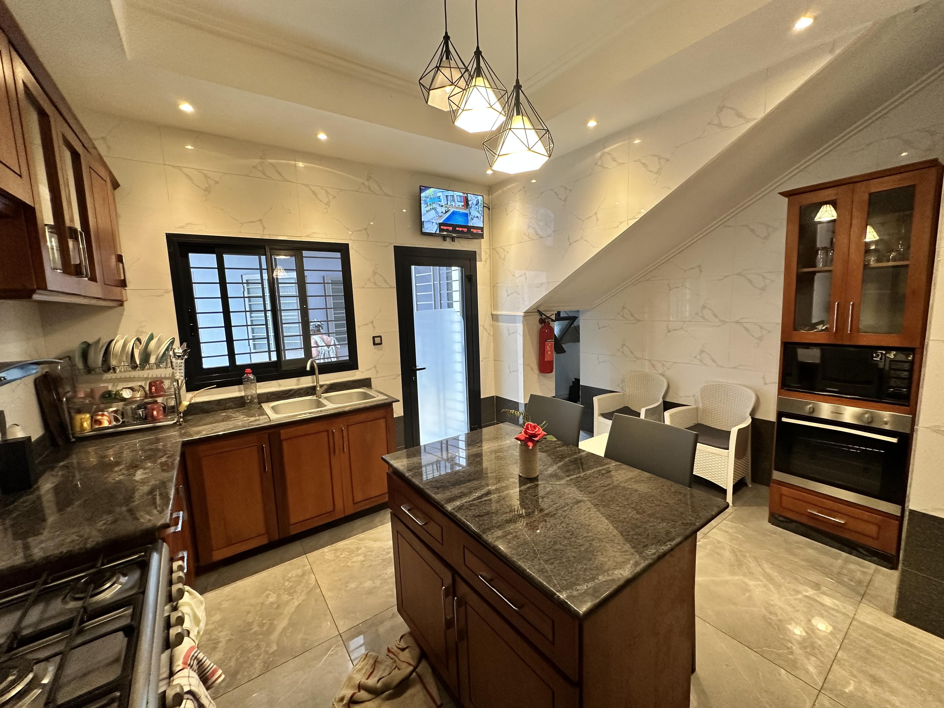 Modern kitchenette with premium appliances