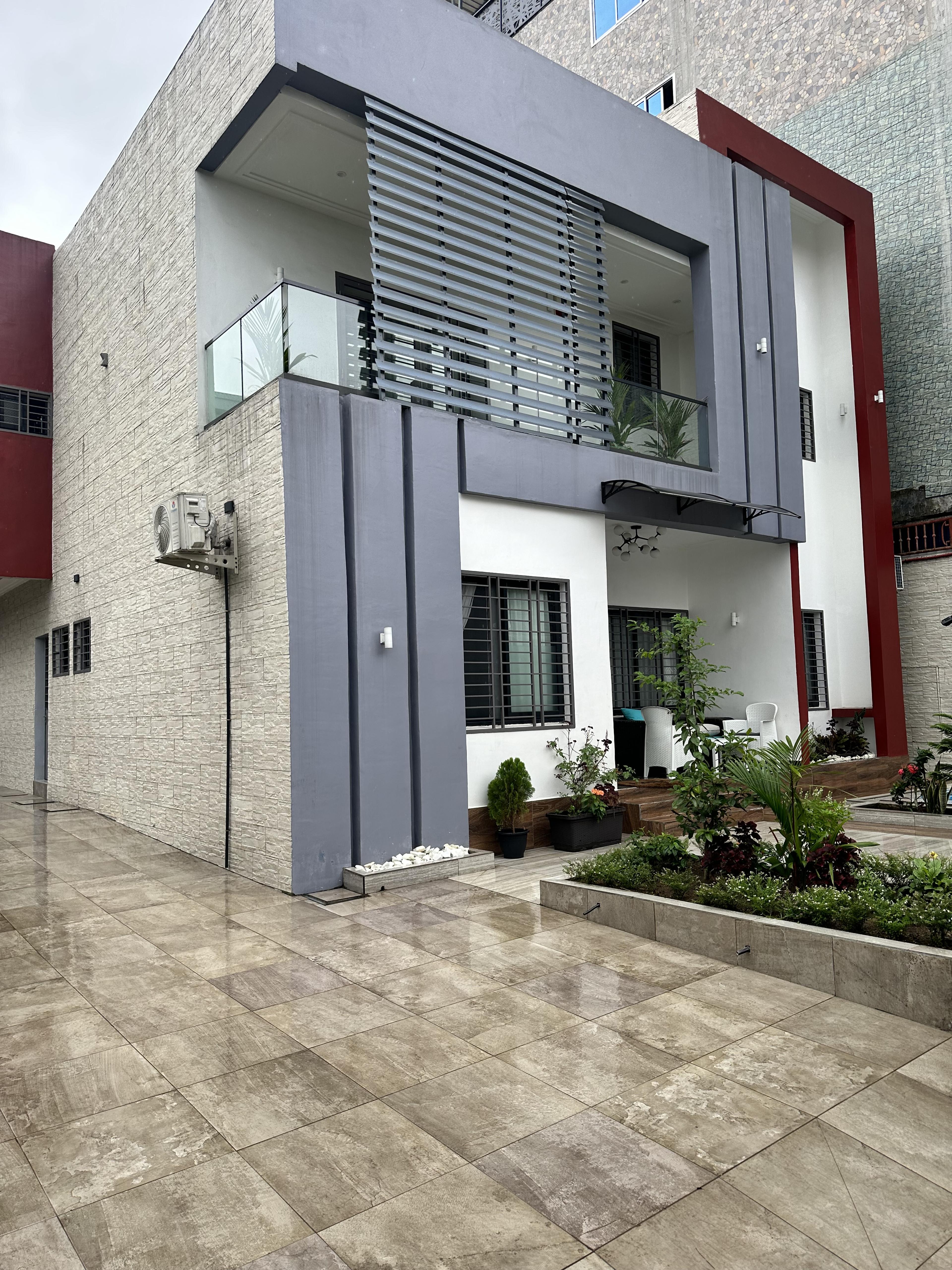 Resort exterior with forest surroundings